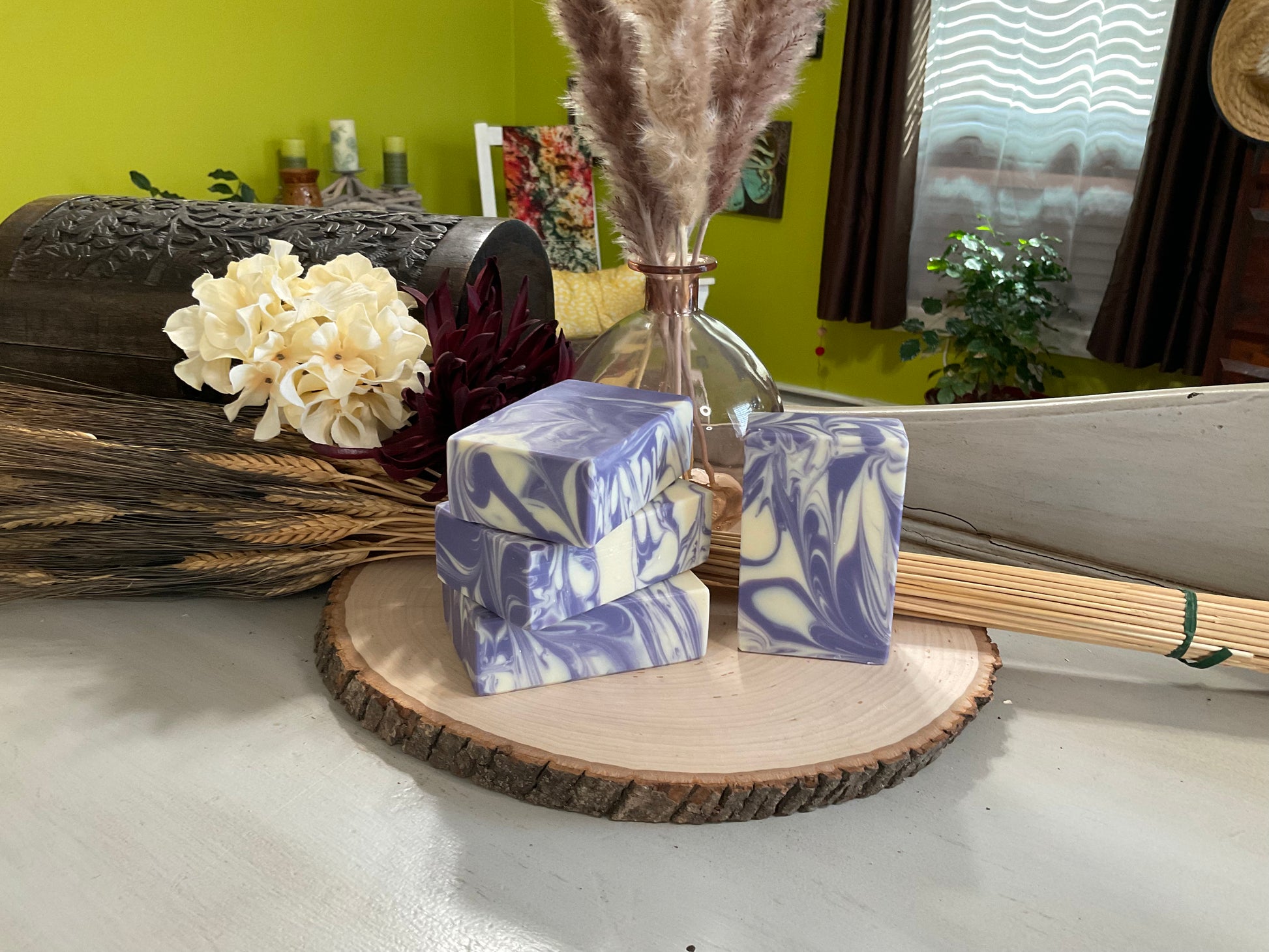 Swirled Artisan Soap in Lavender Grove scent with notes of lavender, bergamot, and cedarwood.