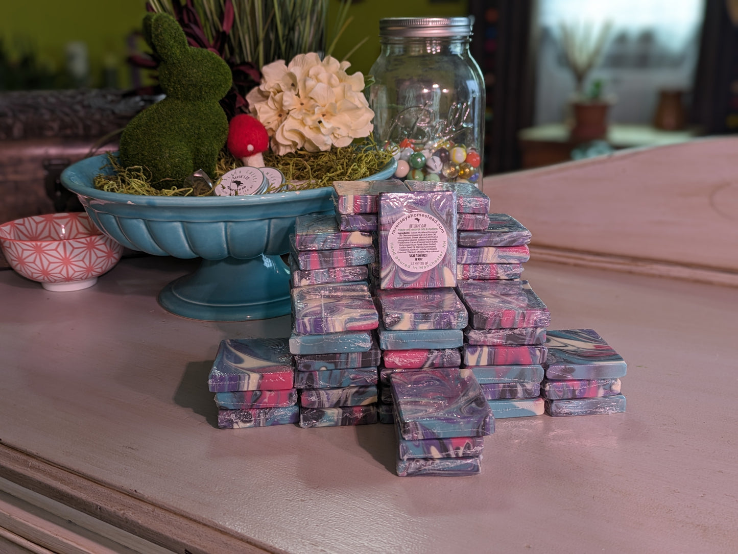 Swirled artisan soap in Sugar Plum Forest scent with notes of citrus, geranium, vetiver, and tonka bean. Mini.